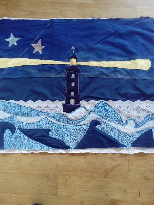 Le Phare dans un ciel nocturne textile
